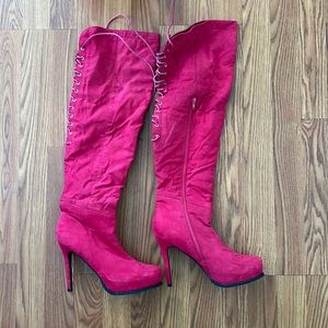 Thigh high magenta boots